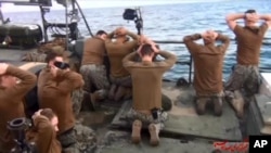 Photo, released by the Iranian state-run IRIB News Agency Jan. 13, 2016, shows detention of U.S. Navy sailors by the Iranian Revolutionary Guards in the Persian Gulf, Iran.