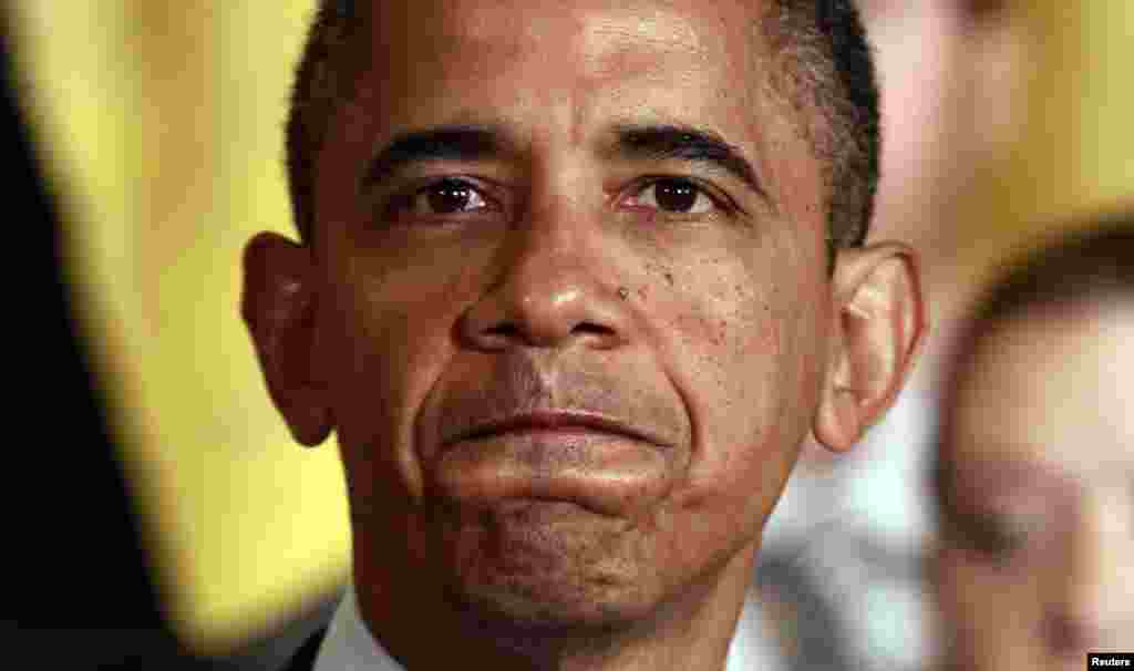 U.S. President Barack Obama speaks about the need for Congress to extend tax cuts for middle class families at the White House in Washington July 9, 2012. REUTERS/Kevin Lamarque (UNITED STATES - Tags: POLITICS)