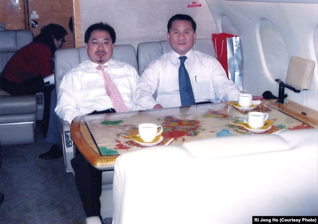 A senior North Korean defector, Ri Jong Ho, right, who oversaw North Korea’s overall production and trade while serving at the Office 39 for decades, heads to Pyongyang with Chinese investment tycoon Sam Pa, December 2006.