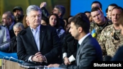 UKRAINE – Ukraine's President and presidential candidate Petro Poroshenko attends a policy debate with his rival, comedian Volodymyr Zelenskiy (R), at the National Sports Complex Olimpiyskiy stadium in Kyiv, on April 19, 2019