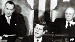 US President John Fitzgerald Kennedy gives a speech on the nation's space effort before a special session of Congress on May 25, 1961, announcing the goal of sending an American safely to the Moon before the end on the decade