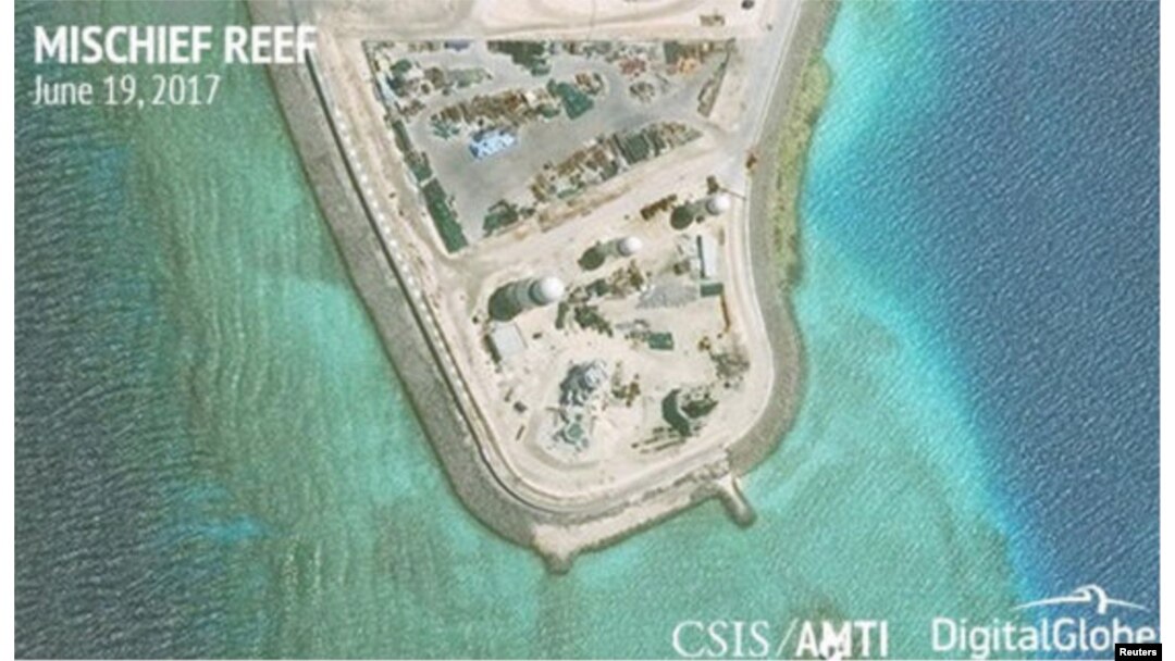 Construction is shown on Mischief Reef in the Spratly Islands, the disputed South China Sea, in this June 19, 2017, satellite image released by CSIS Asia Maritime Transparency Initiative at the Center for Strategic and International Studies (CSIS) to Reuters.