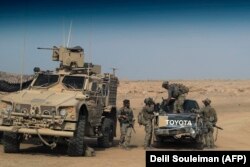 SYRIA -- U.S.-backed forces are pictured near the village of Susah in the eastern province of Deir Ezzor, near the Syrian border with Iraq, September 13, 2018