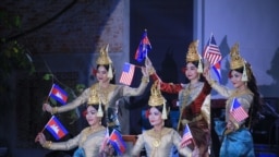 Khmer Apsara dancers holding both American and Cambodian flags open a ceremony to commemorate 70 years of diplomatic ties between the two countries, January 2020. (Photo courtesy of U.S. Embassy in Cambodia) 