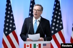 FILE - U.S. Trade Representative Robert Lighthizer talks to reporters at the end of the second round of NAFTA talks in Mexico City, Sept. 5, 2017.