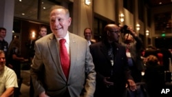 FILE- In this Sept. 26, 2017, photo, former Alabama Chief Justice and U.S. Senate candidate Roy Moore greets supporters before his election party in Montgomery, Alabama. 