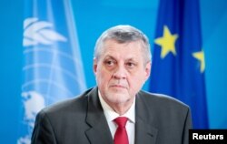 FILE - U.N. envoy Jan Kubis holds a news conference following a meeting on the political process in Libya at the Foreign Ministry in Berlin, Germany, March 18, 2021.