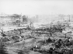 Последствия беспорядков в Талсе, когда толпа белых погромщиков разрушила район, где проживали афроамериканцы, 1 июня 1921 года