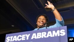 FILE - Georgia Democratic gubernatorial candidate Stacey Abrams speaks to supporters during an election night watch party in Atlanta, Nov. 6, 2018. 