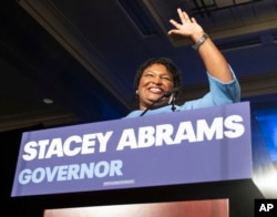 FILE - Georgia Democratic gubernatorial candidate Stacey Abrams speaks to supporters during an election night watch party in Atlanta, Nov. 6, 2018.