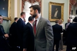 Senator Tom Cotton walking through the U.S. Capitol in January.