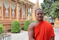 Venerable Dean Det, 25, who became a monk nine years ago at Chumpouvaon pagoda, in Oudong district, Kandal province, told VOA that since the outbreak of COVID-19, monks at his pagoda have faced food shortage. (Phorn Bopha /VOA)