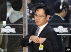 FILE - Lee Jae-yong, a vice chairman of Samsung Electronics Co., arrives for a hearing at the National Assembly in Seoul, South Korea, Tuesday, Dec, 6, 2016.