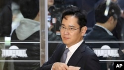 FILE - Lee Jae-yong, a vice chairman of Samsung Electronics Co., arrives for a hearing at the National Assembly in Seoul, South Korea, Dec, 6, 2016. 