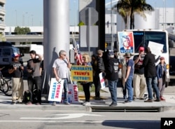 Supporters of President Donald Trump gather at Los Angeles International Airport during protests against Trump's executive order banning travel from seven Muslim-majority countries, Los Angeles, Calfornia, Jan. 29, 2017.