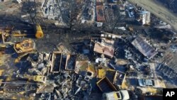 A photo, shot from a drone, shows the scene of a recycling yard in Middletown, Calif. where a body was found in the burned ruins, Sept. 17, 2015.