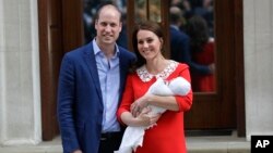 Принц Уильям и Кейт Миддлтон с сыном. Лондон, Великобритания. 23 апреля 2018 г.