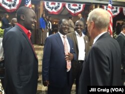 FILE - Kenya's opposition leader Raila Odinga speaking to U.S. Ambassador Robert Godec during an election results watch breakfast at the ambassador’s home in Nairobi, 9 Nov. 2016.