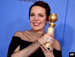 Olivia Colman poses in the press room with the award for best performance by an actress in a motion picture, musical or comedy for "The Favourite" at the 76th annual Golden Globe Awards at the Beverly Hilton Hotel on Sunday, Jan. 6, 2019, in Beverly Hills