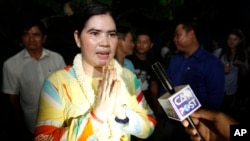 A prominent leader of Cambodia's land rights activist Tep Vanny, upon arrival at her home in Boeung Kak, in Phnom Penh, Aug. 20, 2018.