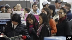 Customers wait in line to shop for 'Black Friday' discounts at a Best Buy store on Nov. 23, 2012 in Philadelphia, Pennslyvania.