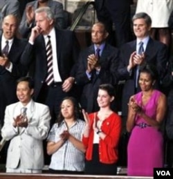 Ibu negara Michelle Obama (kanan) dan para tamu undangan pada pidato Presiden Obama di depan Kongres AS (8/9).