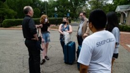Georgetown University students gather before moving into their rooms for a summer program in 2021.