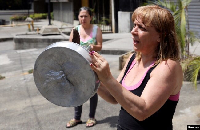 A protester is seen during the blackout in Caracas, Venezuela, March 31, 2019.