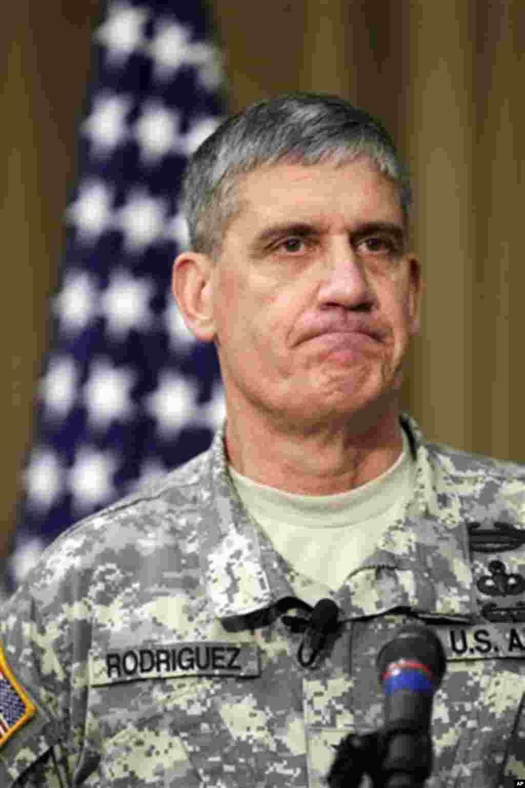 Army Gen. David M. Rodriguez, commanding general of U.S. Army Forces Command, talks to reporters, Friday, March 16, 2012, at Joint Base Lewis-McChord in Washington state. Rodriguez said there was �sufficient screening� for post-traumatic stress disorders 