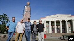 The Waldos, from left, Mark Gravitch, Larry Schwartz, Dave Reddix, Steve Capper and Jeffrey Noel pose below a statue of Louis Pasteur at San Rafael High School in San Rafael, California, April 13, 2018. Friday is April 20, or 4/20. That’s the numerical code for marijuana’s high holiday, a celebration and homage to pot’s enduring and universal slang for smoking. And the five Northern California high school stoner buddies widely credited with creating the shorthand slang for getting high nearly 50 years ago now serve as the day's unofficial grand masters.