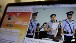 A photo described as the trial showing human rights lawyer Xie Yang which is seen on the social media of the Changshai Intermediate People's Court is displayed on a computer in Beijing, May 8, 2017.