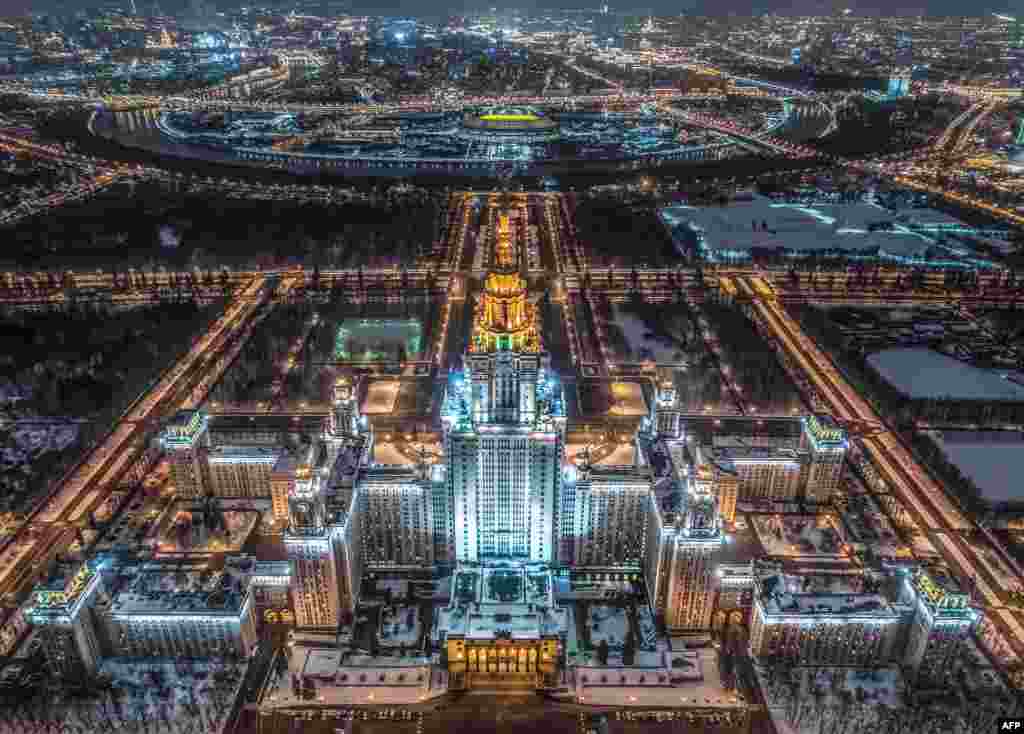An aerial view of the main building of the Moscow State University, Luzhniki Stadium and the Moskva River, Russia.