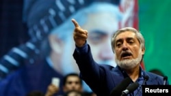 FILE - Afghan presidential candidate Abdullah Abdullah meets with supporters in Kabul, July 8, 2014.