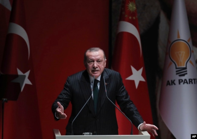 FILE - Turkish President and ruling Justice and Development (AK) Party chair Recep Tayyip Erdogan speaks at a meeting of his party in Ankara, Dec. 6, 2018. “No one can lecture our country about democracy, human rights, and freedom,” Erdogan said a recent event.