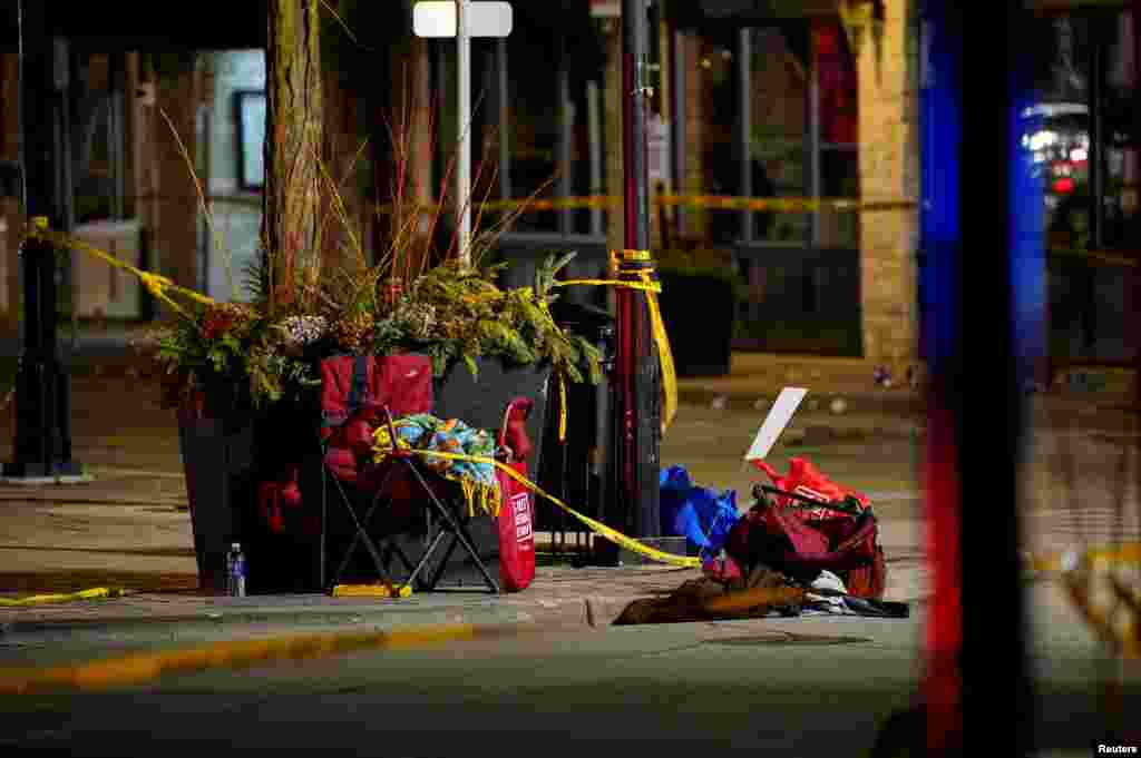 Chairs are left abandoned after a car drives at high speeds through a holiday parade in Waukesha, Wisconsin.