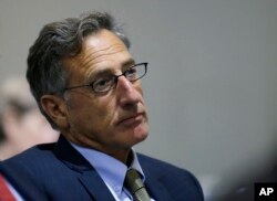 FILE - Vermont Gov. Peter Shumlin, pictured at a New England-Canadian leaders conference in Boston in August 2016, says Americans should "be both alarmed and outraged" by reports of Russian cyberattacks in the U.S.