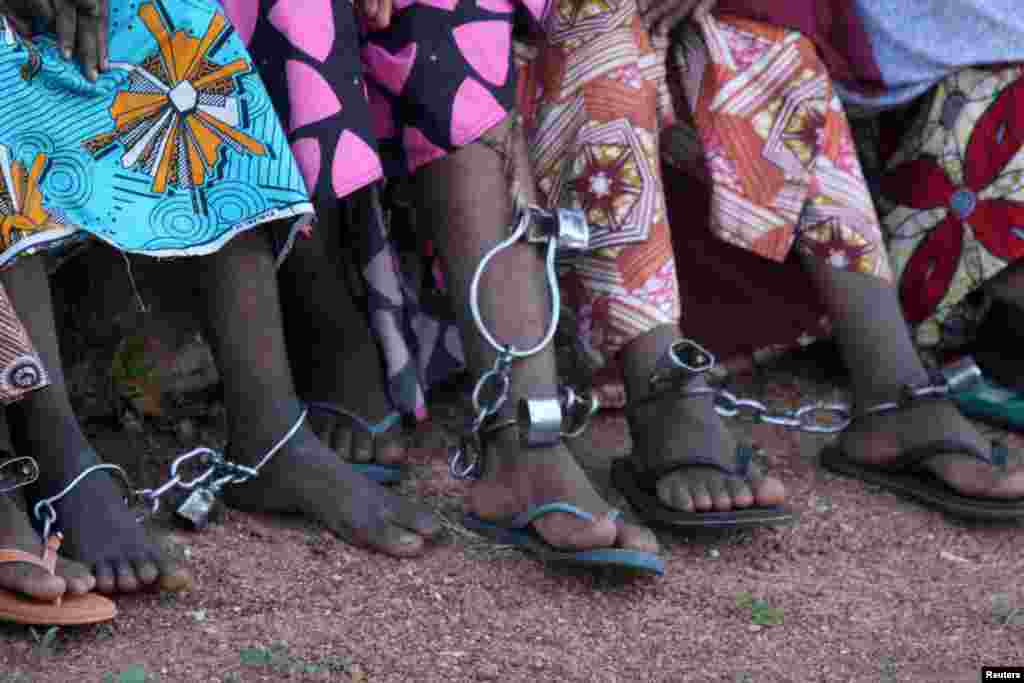 Shackles and padlocks are seen on the ankles of some of the female captives rescued by police from a reformation center in Kaduna, Nigeria, Oct. 19, 2019.