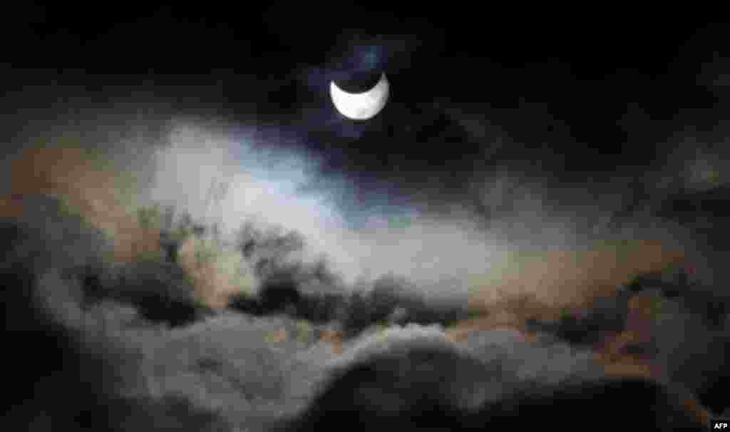 A view of a partial solar eclipse as seen from Gaza City. (Hatem Moussa/AP)