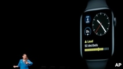 Apple's Haley Allen speaks about the Apple Watch at the Apple Worldwide Developers Conference in San Jose, Calif., Monday, June 3, 2019. (AP Photo/Jeff Chiu)