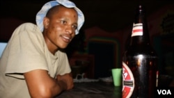 Dali Maleyile acknowledges that binge drinking is a problem in his home village (D. Taylor/VOA)