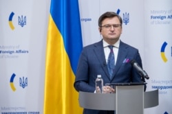 FILE - This handout photo taken and released by the Ukrainian Foreign Ministry's Press Office Jan. 17, 2022 shows Ukrainian Foreign Minister Dmytro Kuleba at a news conference in Kyiv.