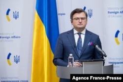 FILE - This handout photo taken and released by the Ukrainian Foreign Ministry's Press Office Jan. 17, 2022 shows Ukrainian Foreign Minister Dmytro Kuleba at a news conference in Kyiv.