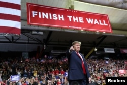 President Donald Trump speaks during a campaign rally at El Paso County Coliseum in El Paso, Texas, Feb. 11, 2019.