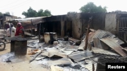 Bangunan yang hancur akibat serangan bom di Maiduguri, Nigeria Utara, pada Januari 2014.