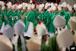 Pope Francis opened a divisive meeting of the world's bishops on family issues Sunday by forcefully asserting that marriage is an indissoluble bond between man and woman, St. Peter's Basilica at the Vatican, Oct. 4, 2015.