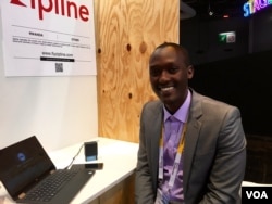 Abdoul Salam Nizeyimana at the Paris tech fair. (VOA/L. Bryant)