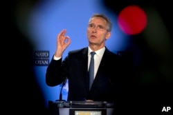 FILE - NATO Secretary-General Jens Stoltenberg speaks during a media conference after a meeting of the NATO-Russia Council at NATO headquarters in Brussels, Jan. 25, 2019.