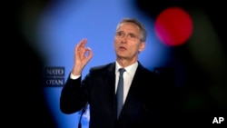 NATO Secretary General Jens Stoltenberg speaks during a media conference after a meeting of the NATO-Russia Council at NATO headquarters in Brussels, Friday, Jan. 25, 2019.