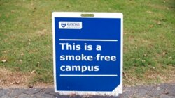 A sign indicates that the University of Aukland campus is smoke-free in Auckland, New Zealand, Dec. 9, 2021.