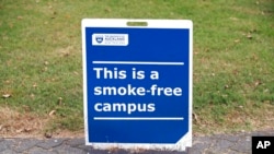 A sign indicates that the University of Aukland campus is smoke-free in Auckland, New Zealand, Dec. 9, 2021.